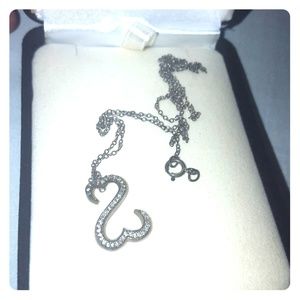 Kay jewelers open hearts collection pendant.